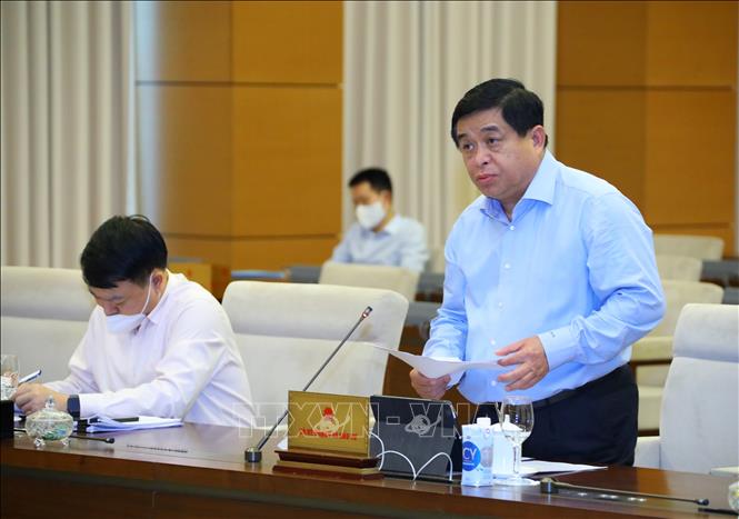 Trong ảnh: Bộ trưởng Bộ Kế hoạch và Đầu tư Nguyễn Chí Dũng trình bày tờ trình. Ảnh: Nguyễn Điệp - TTXVN